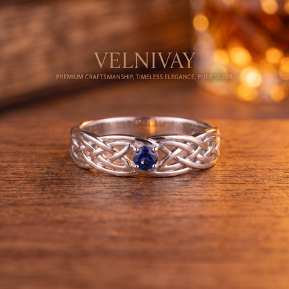 VELNIVAY Celeste Knot Ring — Blue Sapphire Celtic Silver Ring